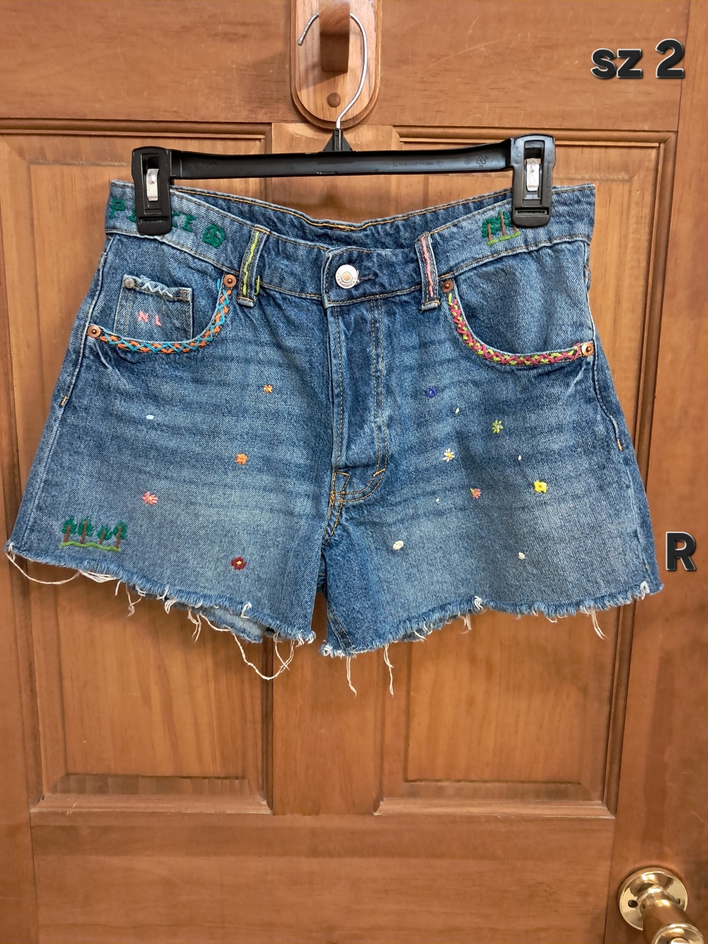 H&M Blue Denim Shorts with Colorful Embroidered Accents